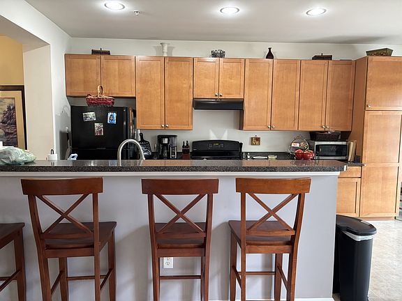 Kitchen with Island and Bar Stools