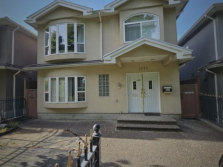 1077 E 62nd Ave — Photo 1