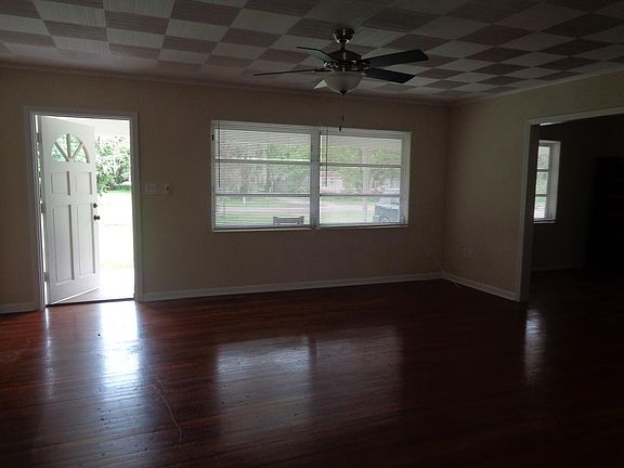 Living / great room opens to covered front porch.