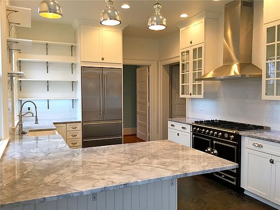 Kitchen completely renovated in 2012 complete with top of the line appliances, granite counters and heated slate floors.