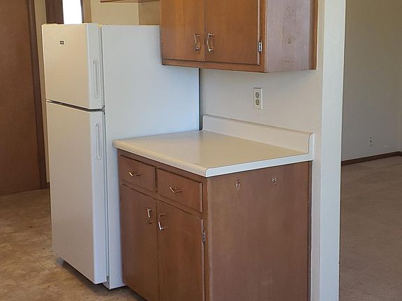 Another view of kitchen from front door.