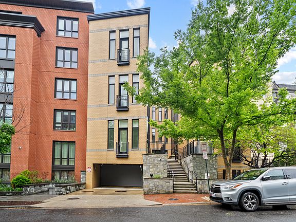 Charming Residential Street View with Tree-Lined Setting
