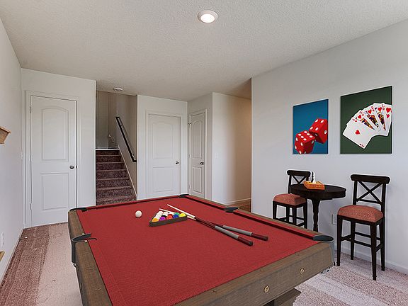 The Nicollet by LGI Homes includes a game room on the lower level for family fun.