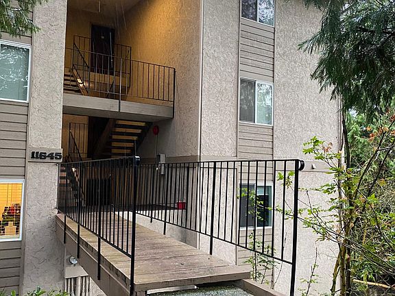 Condo Unit is located in the bottom right corner of this picture. 1st floor end unit with windows on 3 sides! Easy access from parking lot just a few steps DOWN (no stairs to climb) and one less neighbor.