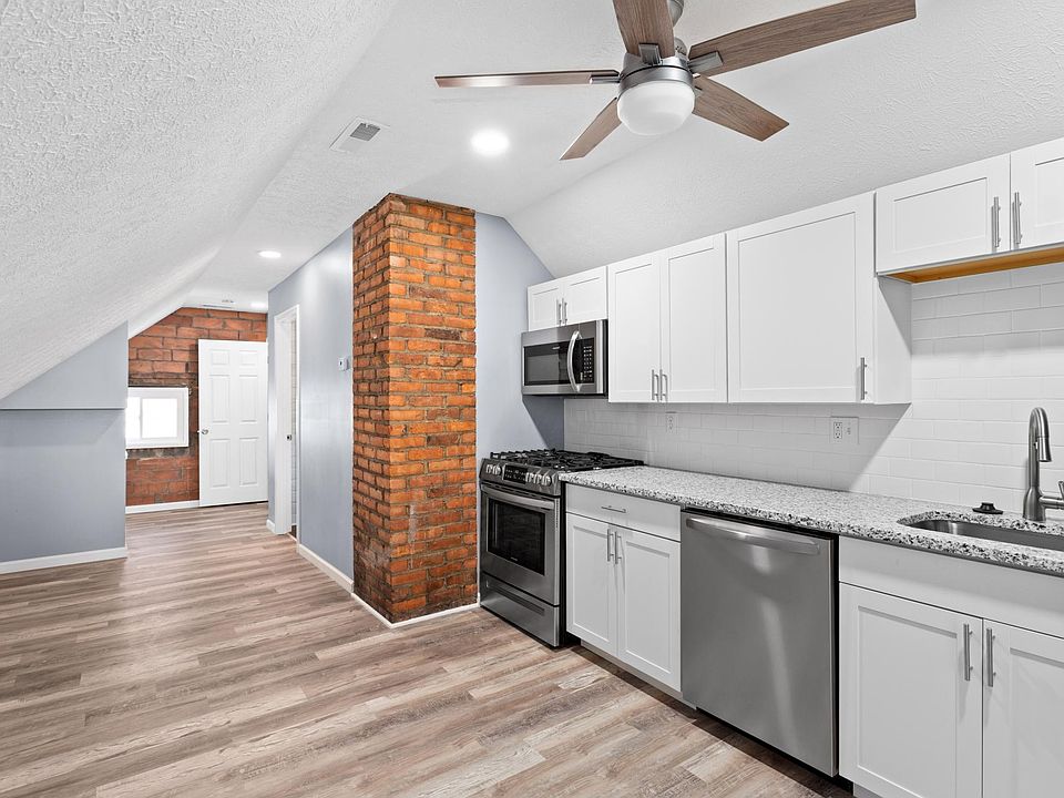 Common area (rear): kitchen, seating, dining areas