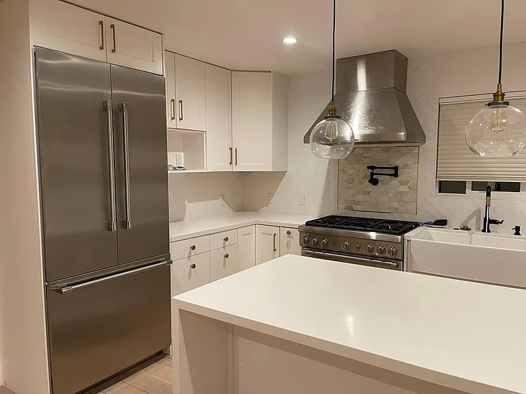 Contemporary kitchen with Thermador stainless steel appliances