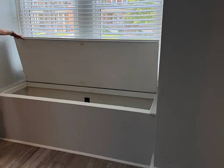 Built-in storage bench in bedroom