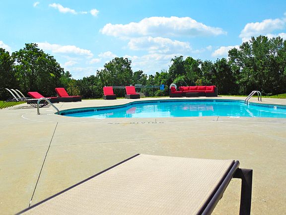 sparkling swimming pool at The Hills Apartments in Kansas Ci