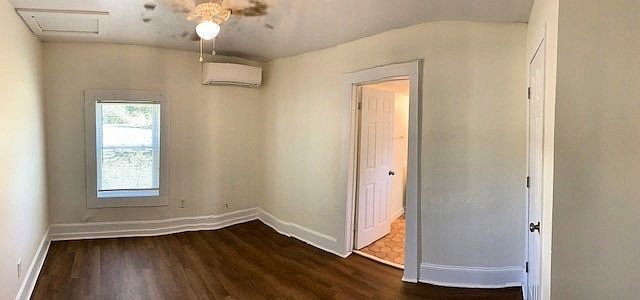 bedroom with minisplit heating/cooling unit, and new ceiling fan
