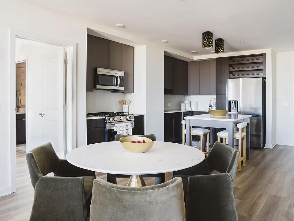 Cook in style with gourmet kitchens, single basin sinks and sleek tile backsplash.
