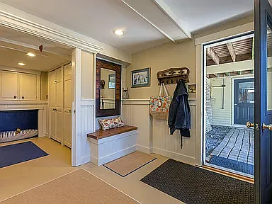 basement entry with path to garage through open door