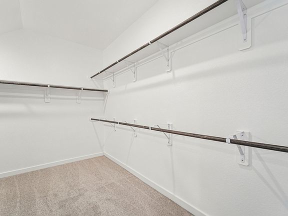 The Reynolds floorplan in Heights of Barbers Hill of Mont Belvieu, TX.