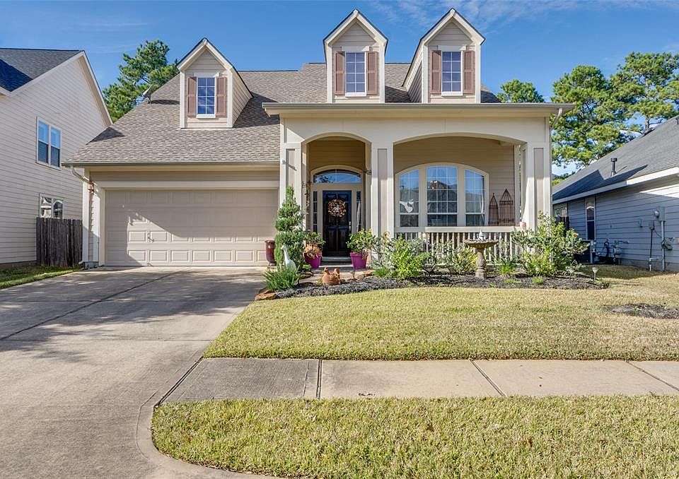 Welcome home to 18923 Magnolia Arbor!