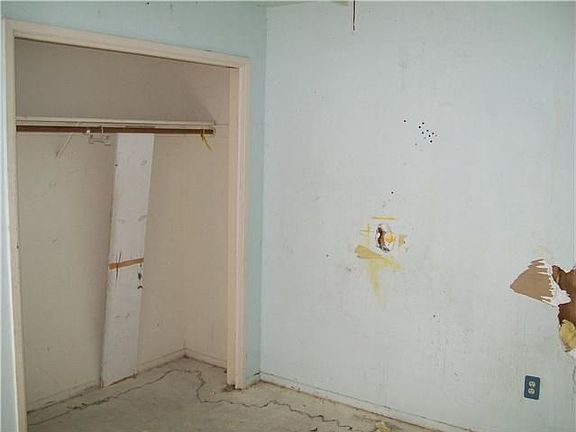 One of 3 bedrooms in main house