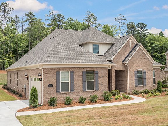 Southampton Exterior 6 features brick and covered front porch