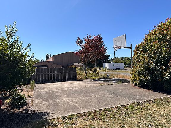 Basketball hoop in side yard