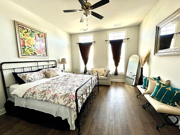 Private suite with king sized bed on first level