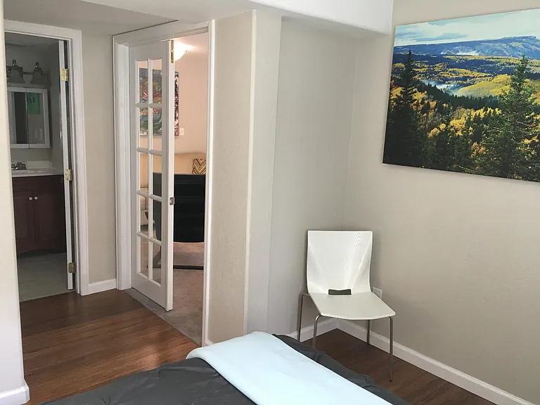 Entrance to bedroom. French doors are to the living room.