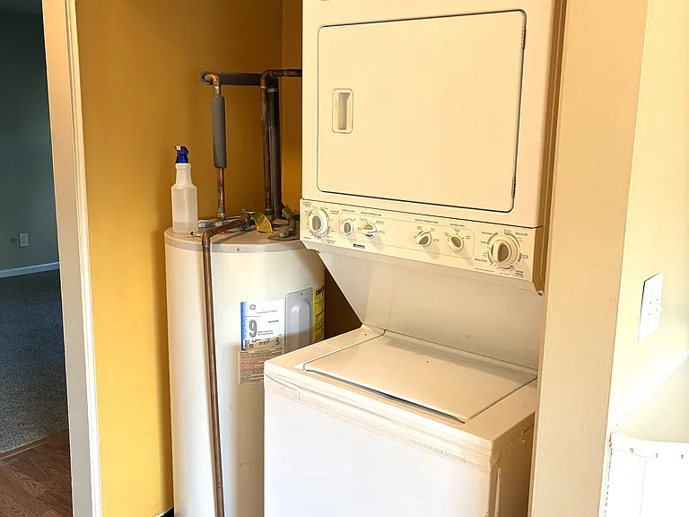 Utility room with washer and dryer