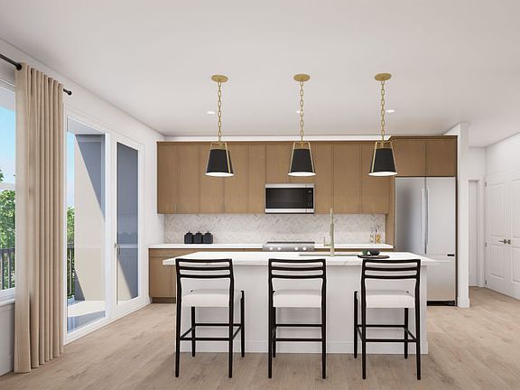 Chef Inspired Kitchen Featuring Quartz Counters and Modern Maple Cabinets