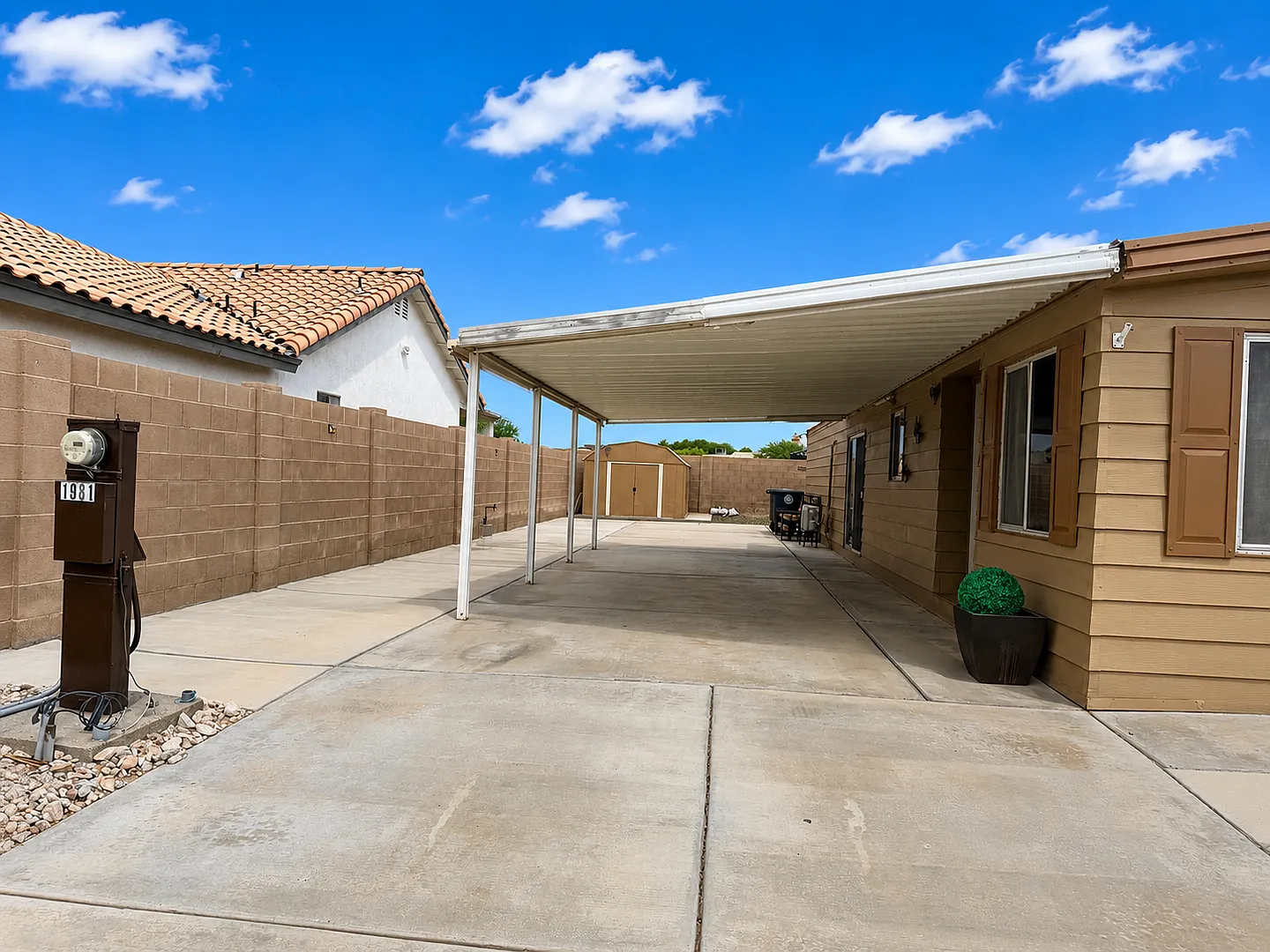 Fully Fenced 3 Bedroom Home with Covered Parking and Landscaped Property — Photo 3