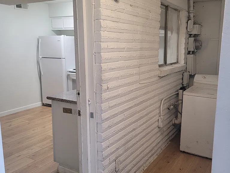 Hall containing laundry space
(Washer not included)