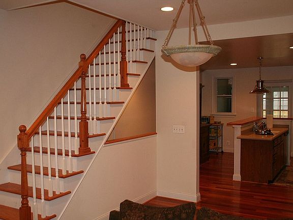 View of Staircase/Kitchen Breakfast Room (from living room)