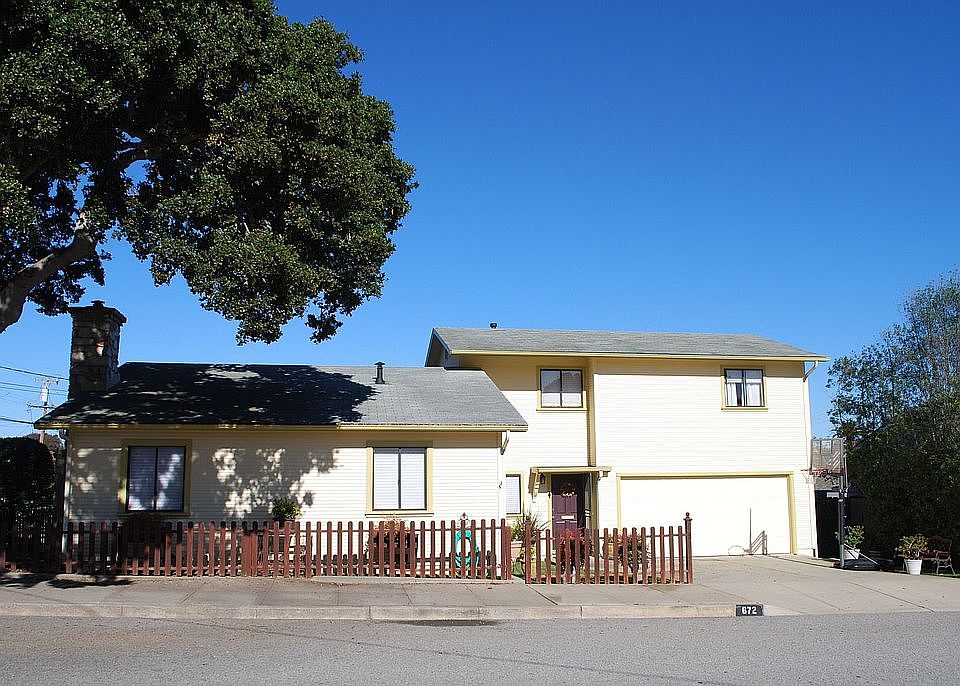 Split Level Splendor, including OVERSIZED Two Car Garage!