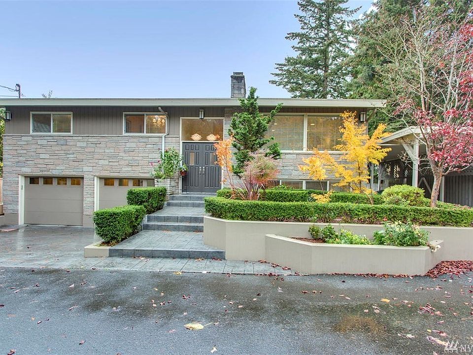 Discover a hidden gem situated atop a shy 1/3 acre lot on a quiet dead-end street in First Hill, one of Mercer Island's most desirable neighborhoods. 