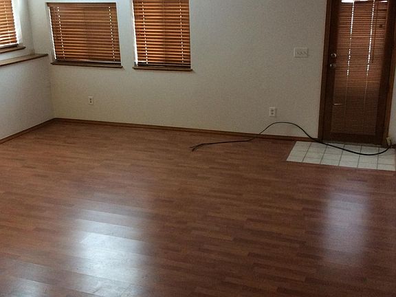 Living room with access to back patio.