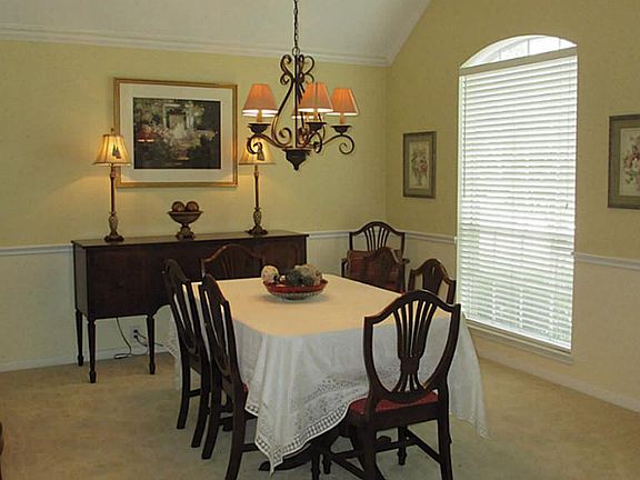 This is your formal dining. Notice the crown/chair molding and two tone paint