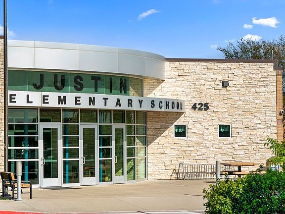 Adjacent to Justin Elementary School