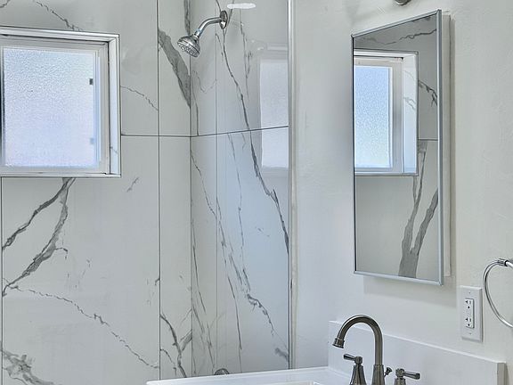 Bathroom vanity and tub/shower combo