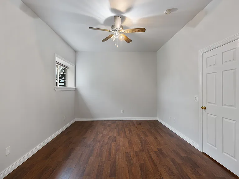 Bottom-level bedroom #5 or media room/2nd home office.