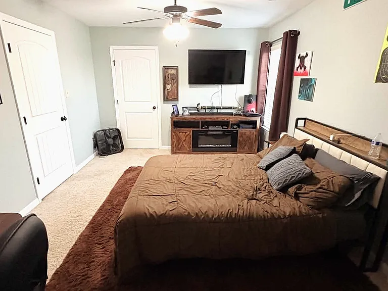 $750 Standard Bedroom - Shown furnished for size reference; rented unfurnished.