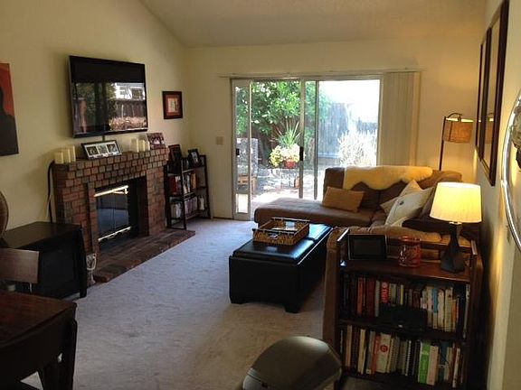 Living room with sliding glass doors to backyard.
