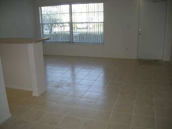 Ceramic tile throughout