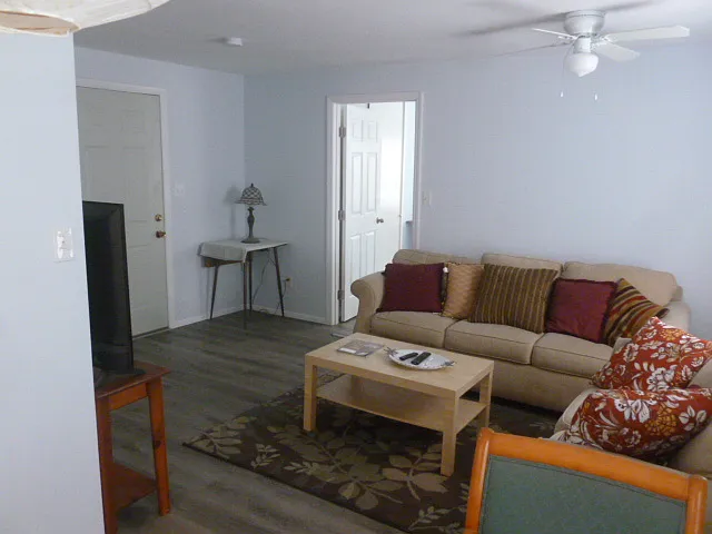 Living room with door to front office/bed room