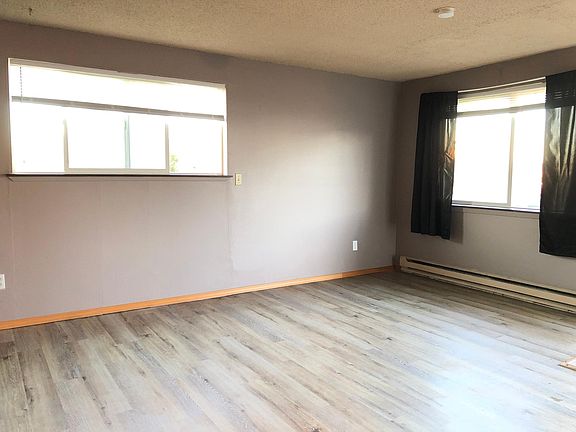 Spacious living room, can add in extra 1 adult to stay and rent will be $1450 / month. Rent INCLUDES Drinking water / Waste water / Surface water, Solid waste & recycling, sewer. Tenant pays electricity only.