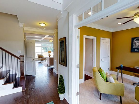 Grand entry with two-story foyer! Photo is representation of home.