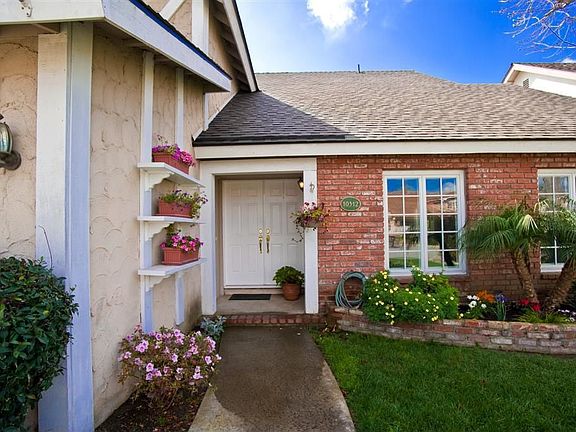 Brick Exterior w/gardens