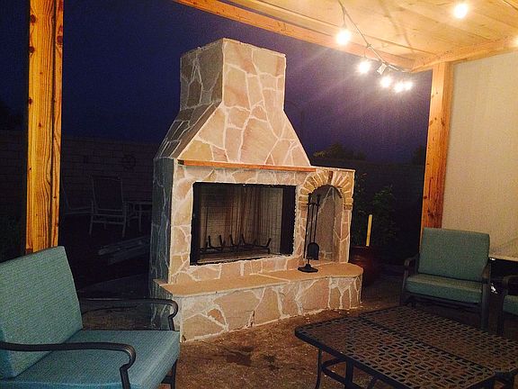 Large backyard fireplace