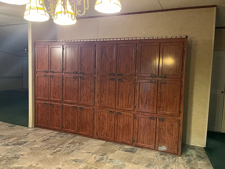 Full wall of cabinets offer and abundant amount of storage!!