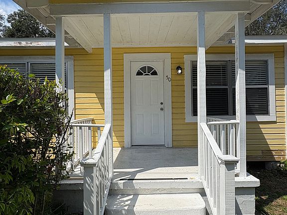 East side of the duplex, front door.
