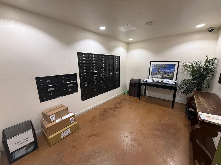 Secure and ample MAIL ROOM. In addition to your mail box, all your deliveries will be delivered into this secure room for safe keeping.