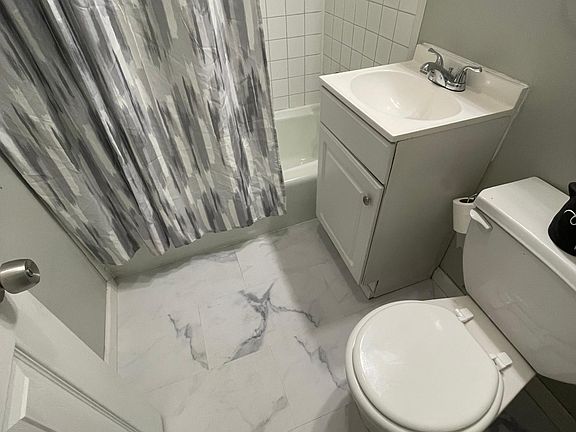 Bathroom. New flooring, vanity, and light