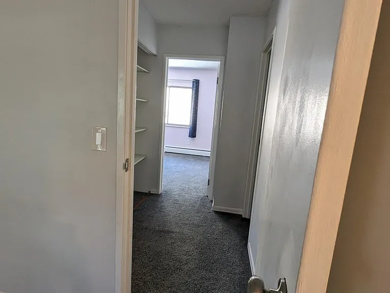 Upstairs bedrooms are separated by stairs/closet and bath