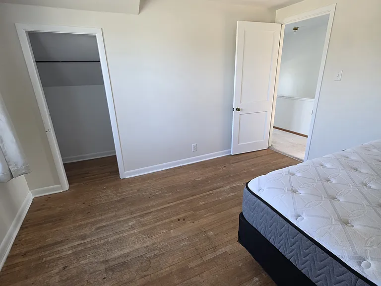 Upstairs Bedroom 1 - spacious closet as well as built-in cabinets for storage.