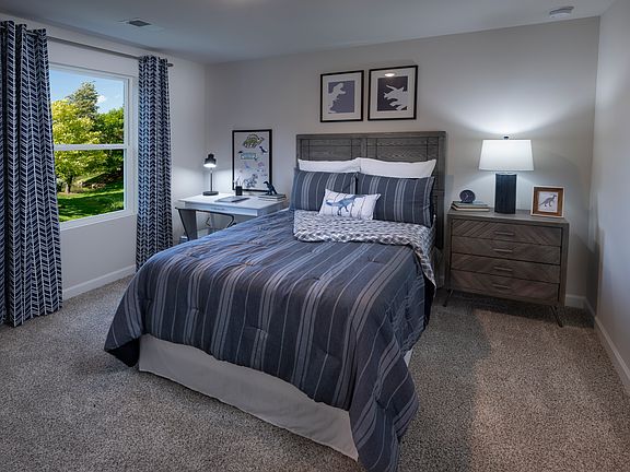 The Lennon floorplan modeled at Village at White Pine.