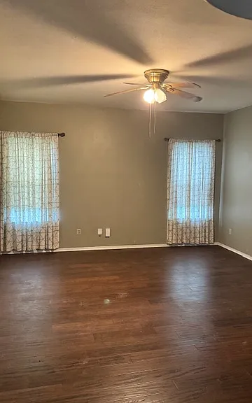 Recently repainted. Wood laminate floors throughout.